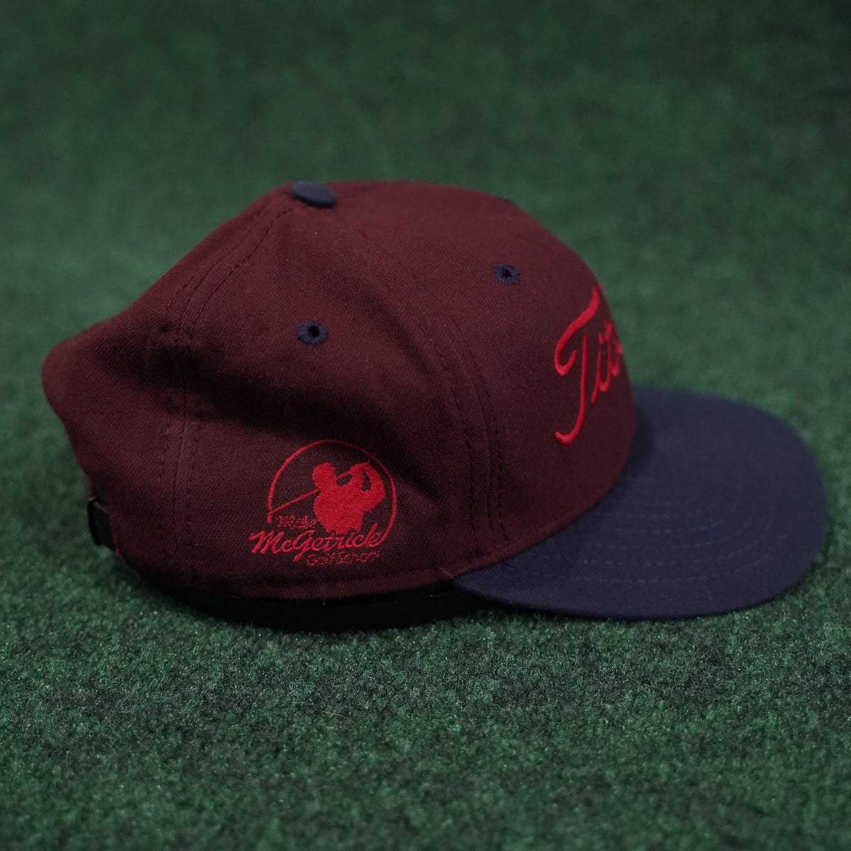 Titleist Mike McGetrick Golf School Strap-Back Hat (Maroon/Navy Brim)